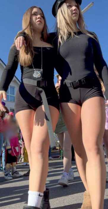 Blonde girls duo showing cameltoe in shorts