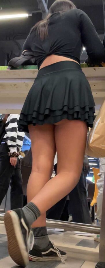 Schoolgirl teen in black skirt upskirt
