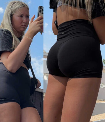 Round ass blonde in black shorts
