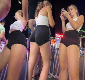 Tall blonde teen in black shorts perfect ass