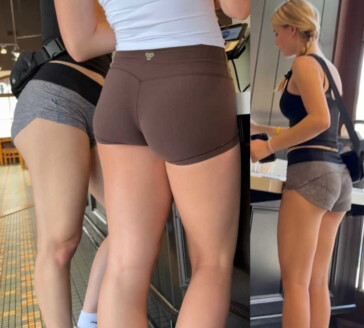 Two sexy girls in shorts in line