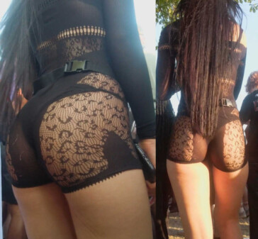 Long hair brunette in see thru dress showing off ass