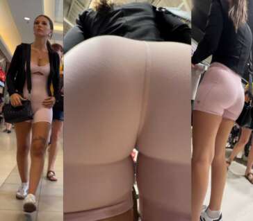 Fit girl in pink shorts shopping
